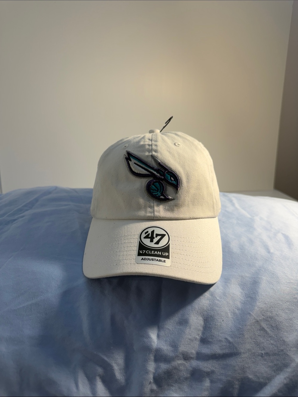 47 White Baseball Cap with Teal and Black Embroidered Logo
